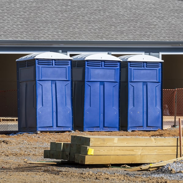 what is the cost difference between standard and deluxe porta potty rentals in Lake Waukomis Missouri